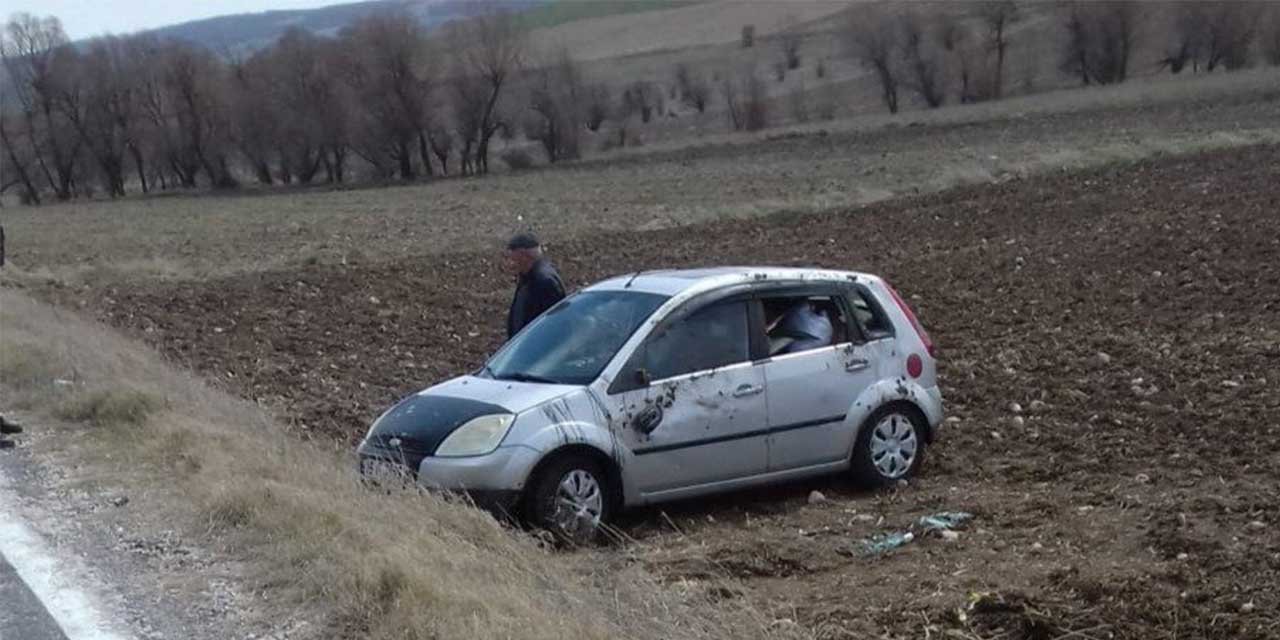 Takla atan otomobilden yara almadan kurtuldu