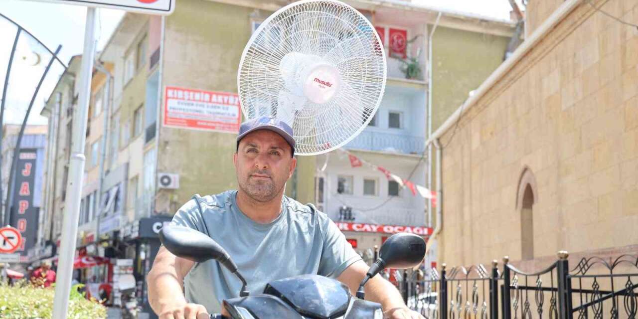 Kırşehir’de sıcaktan bunalan vatandaş, elektrikli motoruna vantilatör taktı